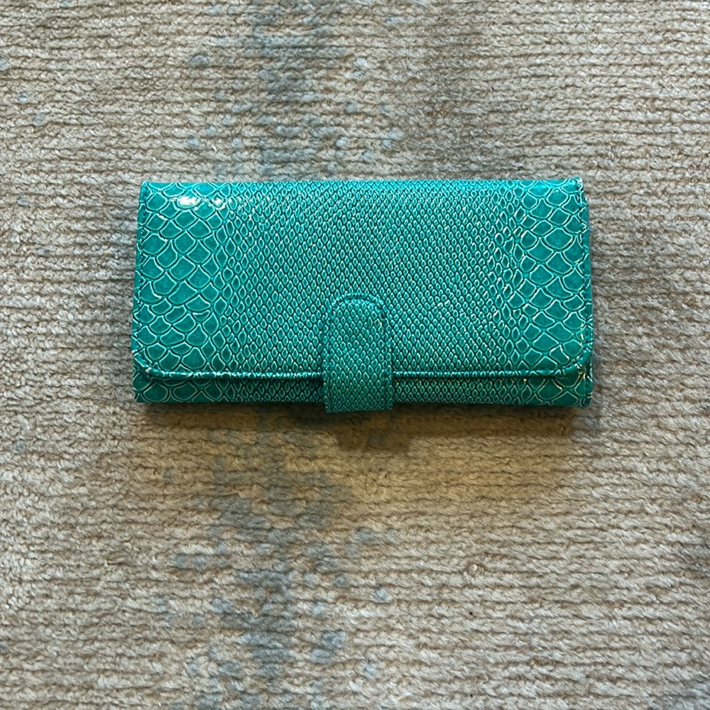 Snake skin turquoise hand bag